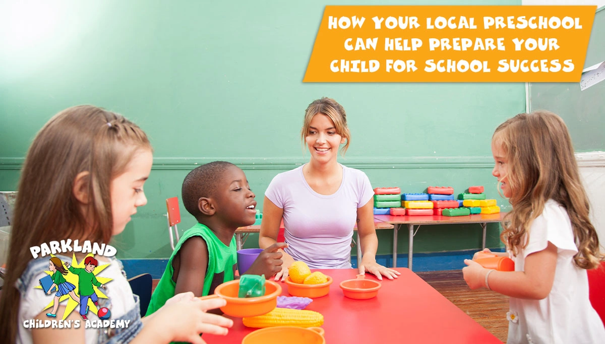 kids at a table with adult in a preschool